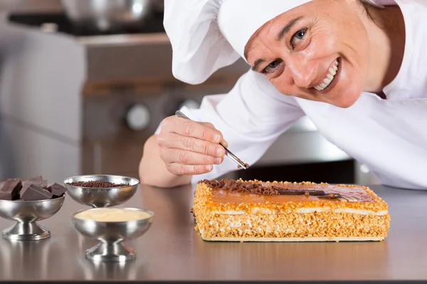 Pastry chef decorating