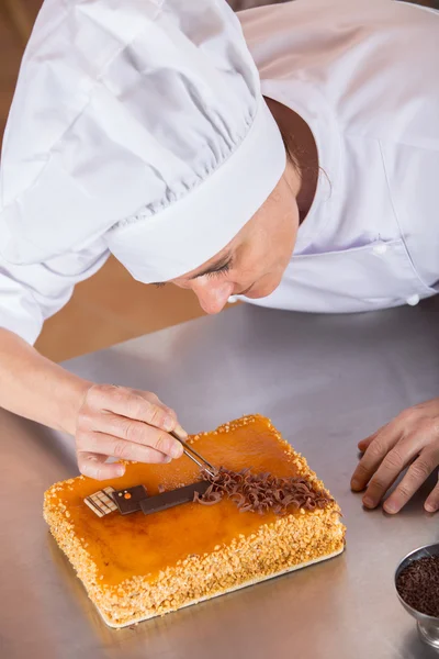 Pastry chef decorating