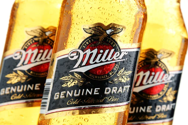 Bottles of Miller Genuine Draft beer over white