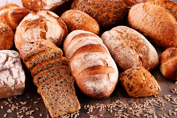 Composition with variety of baking products on wooden table