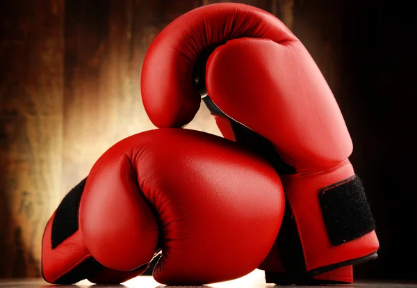 Pair of red leather boxing gloves