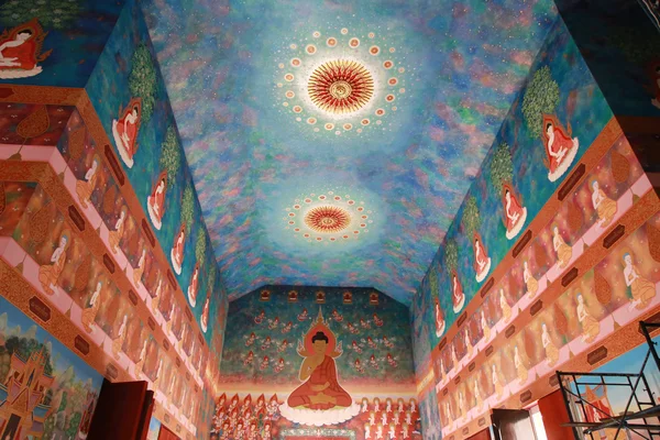 Colorful Buddhist art painting on the wall and ceiling