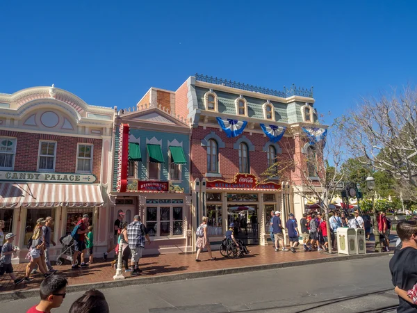 Tourists enjoy Main Street USA at the Disneyland Park