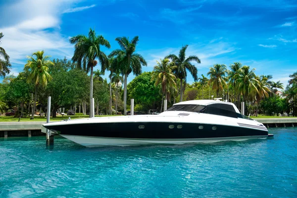 Luxury speed yacht near tropical island in Miami, Florida