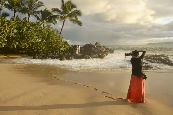 Photographer Shooting Wedding Couple, Secret Beach, Maui, Hawaii