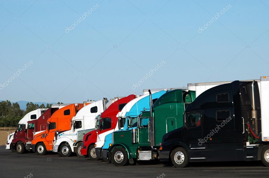 Semi Trucks Lined Up In A Row \u2014 Stock Photo \u00a9 digital94086 82969204