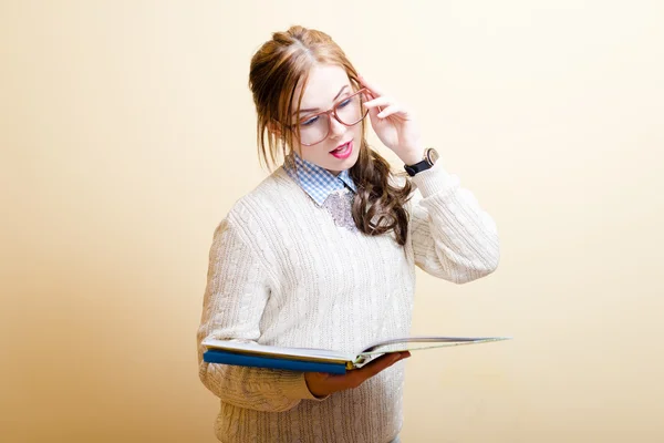 Lady in glasses with books