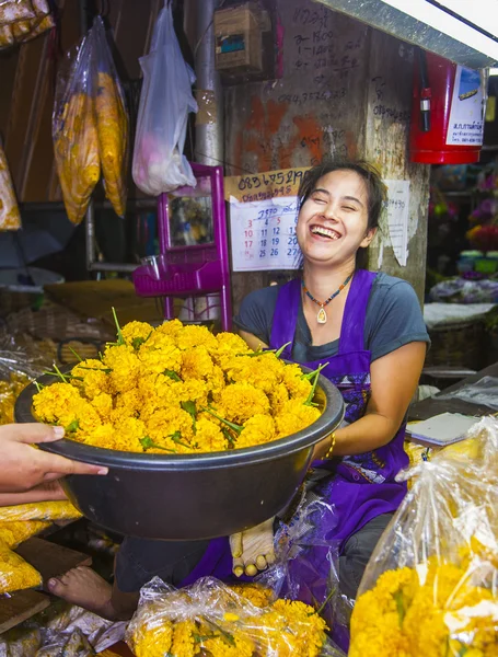 Women are selling fresh flowers at the morning market Pak Khlong Thalat i