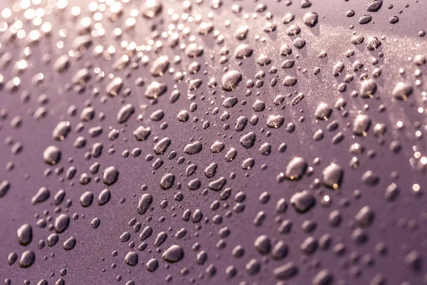 Water drops on a metallic surface