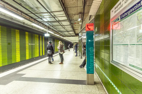 Subway with people at station Merianplatz