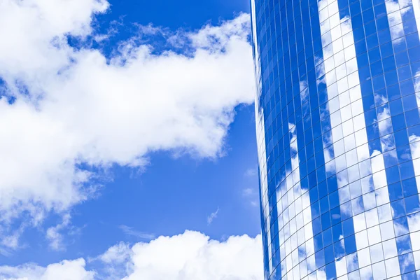 Facade of  skyscraper in New York under blue sky