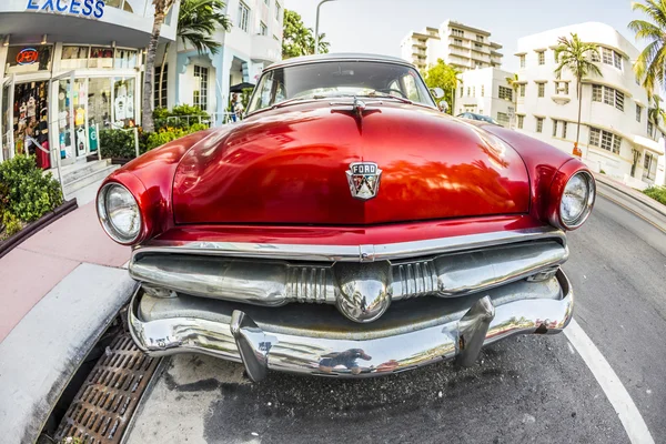 Ford Vintage car parked at Ocean Drive in Miami Beach