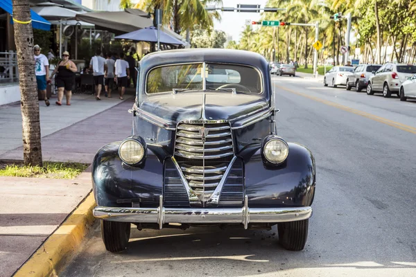 Classic Oldsmobile parks at ocean drive