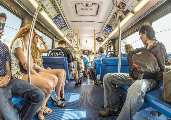 People in the downtown Metro bus in Miami, USA