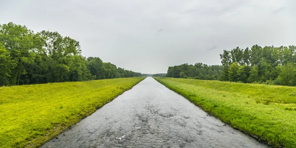 Canal in Elsass in rain