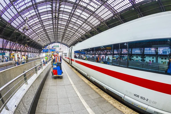 People hurry to the intercity train