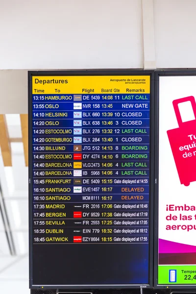 Flight information display screen board at airport of Arrecif