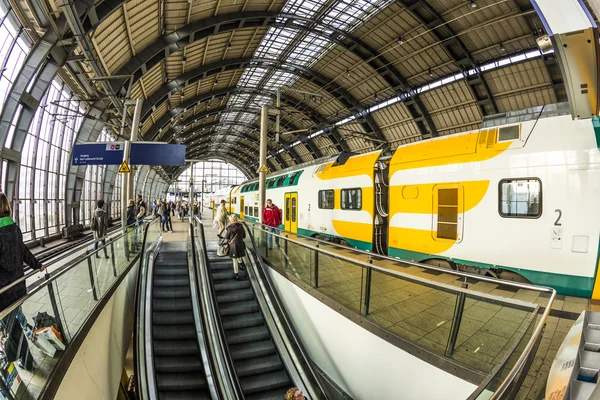 People travel at Alexanderplatz subway station in Berlin