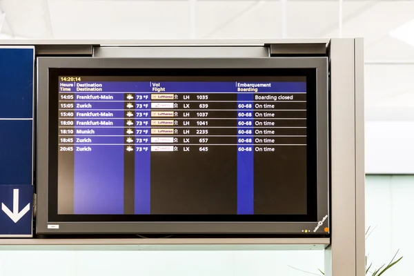 Board with the schedule of departures of planes indicates latest