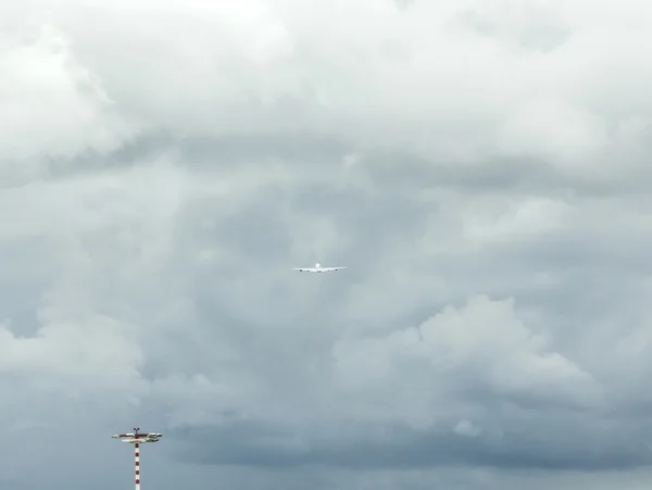 Aircraft in the clouds after take off