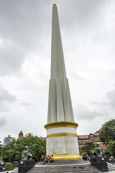 People visit the  Independence Monument obelisk