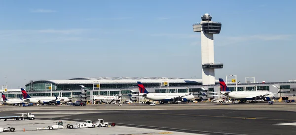 Air Traffic Control Tower and Terminal 4 with Air planes at the
