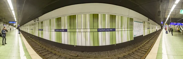 People wait at the metro station in Frankfurt