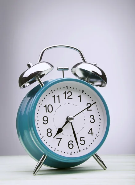 Green alarm clock morning wake-up time