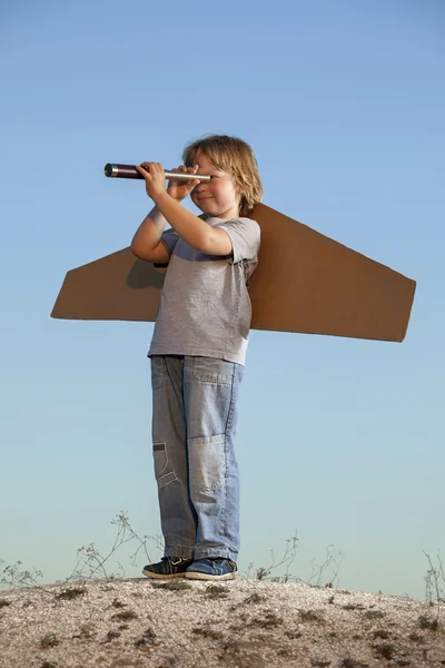 boy with cardboard boxes of wings