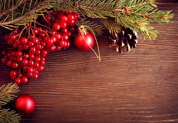 Christmas tree ornaments and viburnum berries