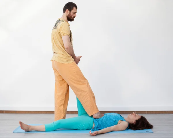 Pair stretching. Thai massage