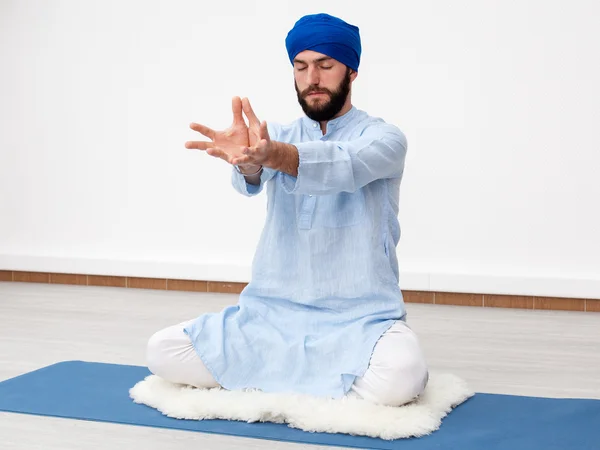 Yoga. Meditation. Yogi man in a turban