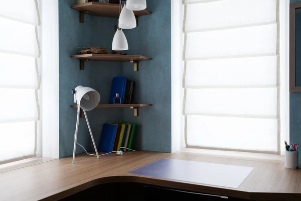 Writing desk with a lamp and book shelves