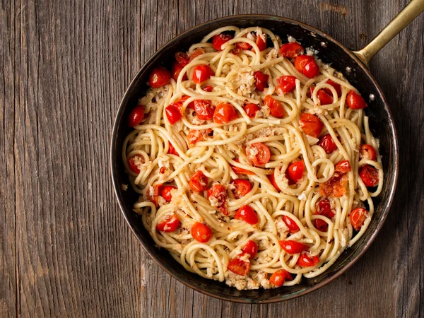 Rustic spicy italian crab and cherry tomato spaghetti pasta