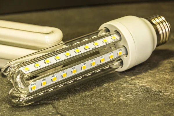 LED bulb in shape similar to a saving CFL bulbs
