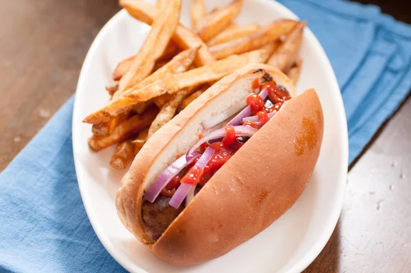 Bratwurst and crispy fries