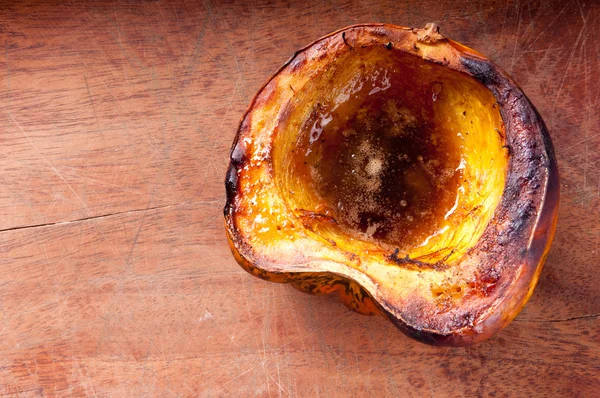 Roasted acorn squash with melted butter and brown sugar