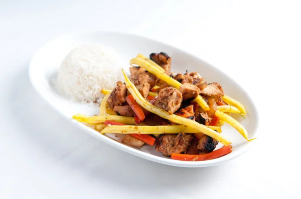 Orange and ginger chicken thigh stir fry