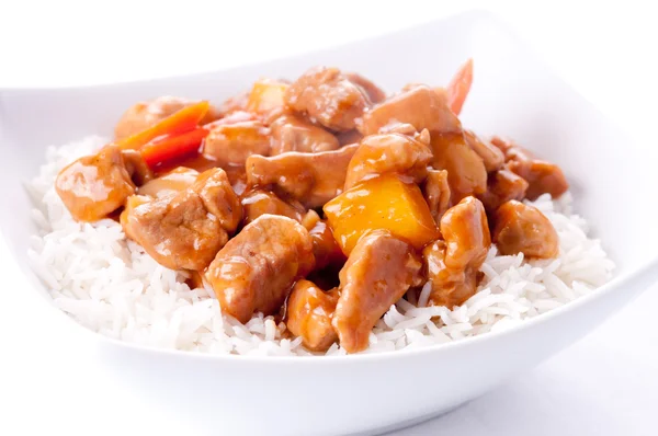Healthy home made sweet and sour pork on white rice