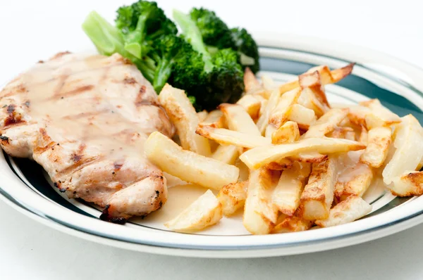 Chicken breast with fries and gravy