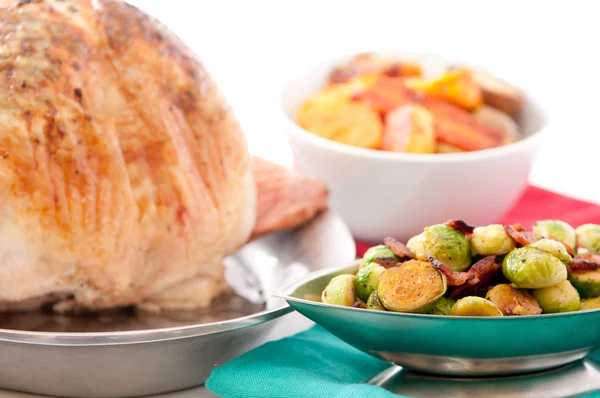 Roast turkey with sides of vegetables