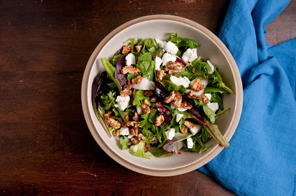 Tossed garden salad with walnuts