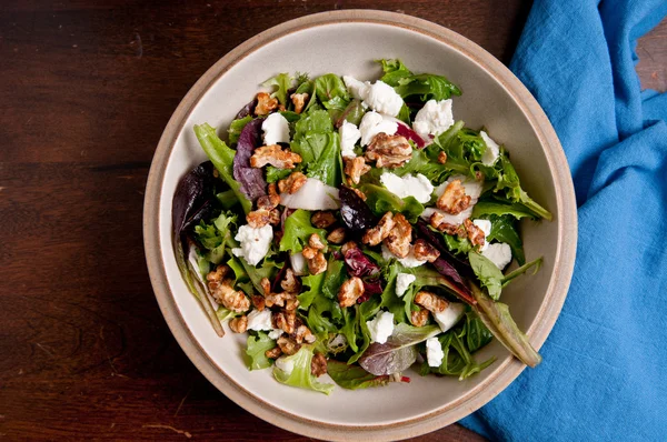 Tossed garden salad with walnuts