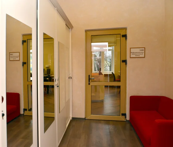 Interior. A view of office room from a corridor