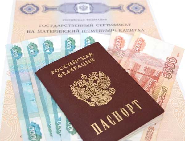 The state certificate on the maternity (family) capital, the Russian money and the passport