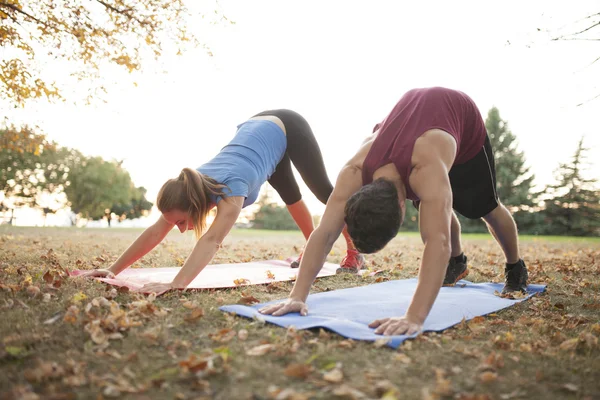 Couple doing yoga