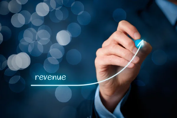 Businessman planning revenue growth