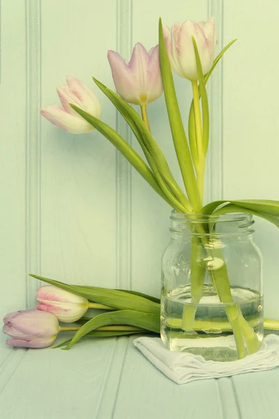 Still life image of Spring flowers with Instagram style cross pr