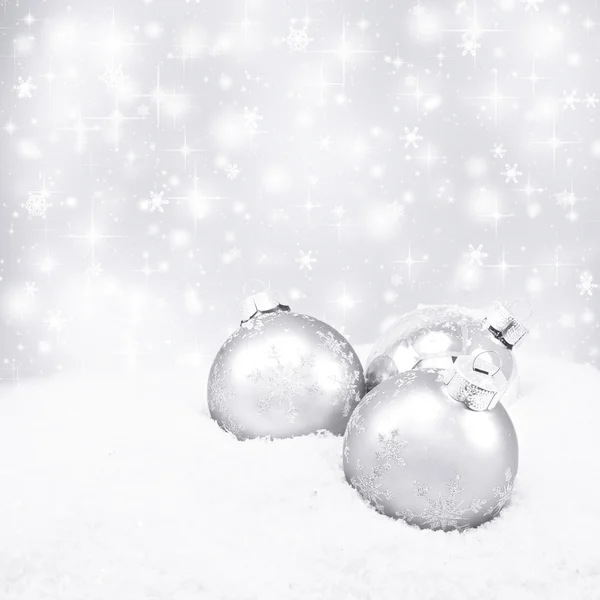 Three silver christmas balls