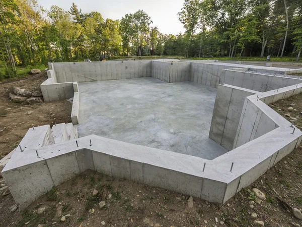Concrete foundation for a new house construction